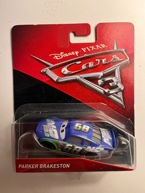 Voiture Cars Disney Pixar Parker Brakestone boîte scotchée car blister abimé