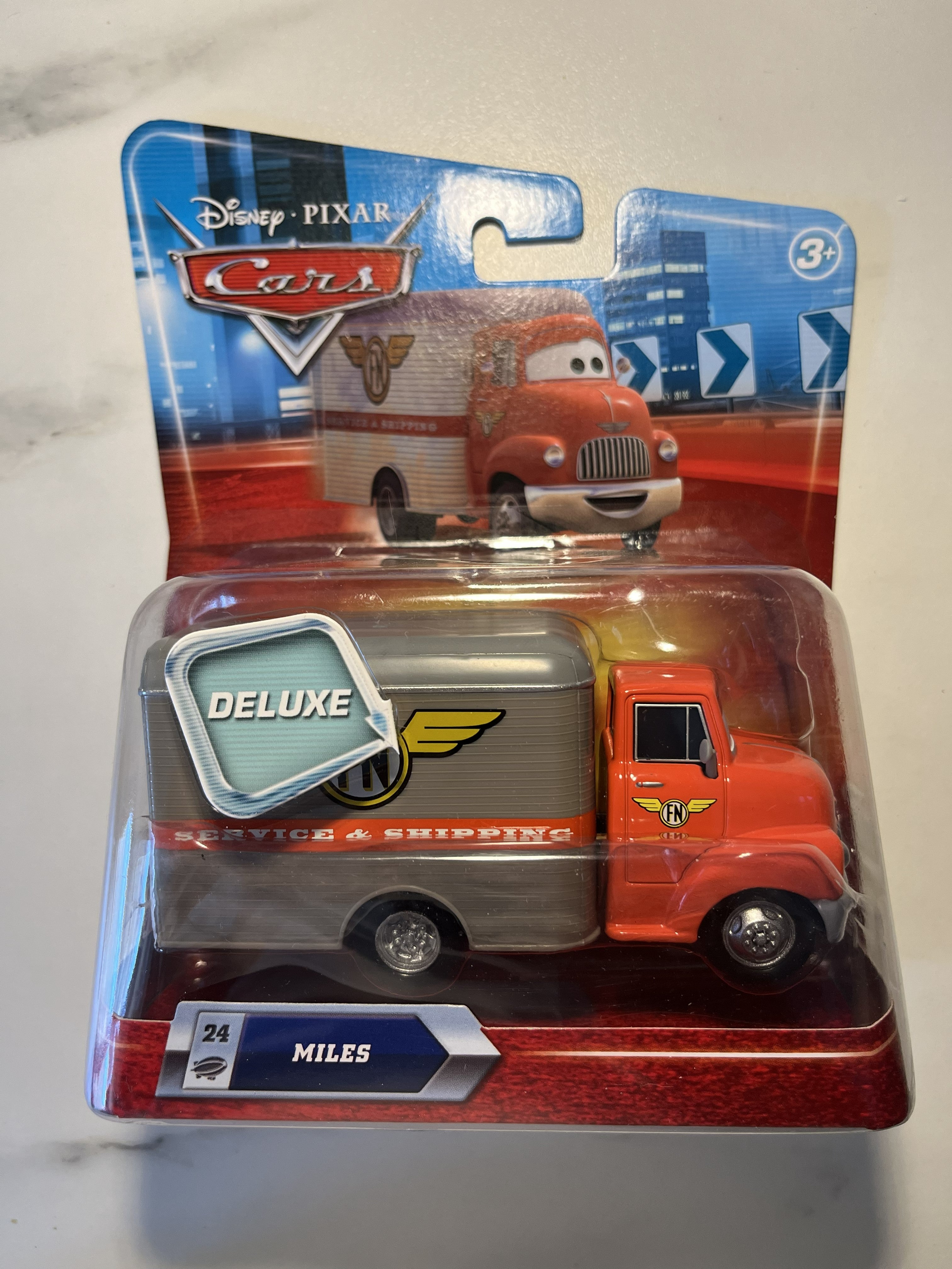 Camion Miles #24 – Disney Pixar Cars Deluxe – Service & Shipping – Mattel – Neuf sous blister