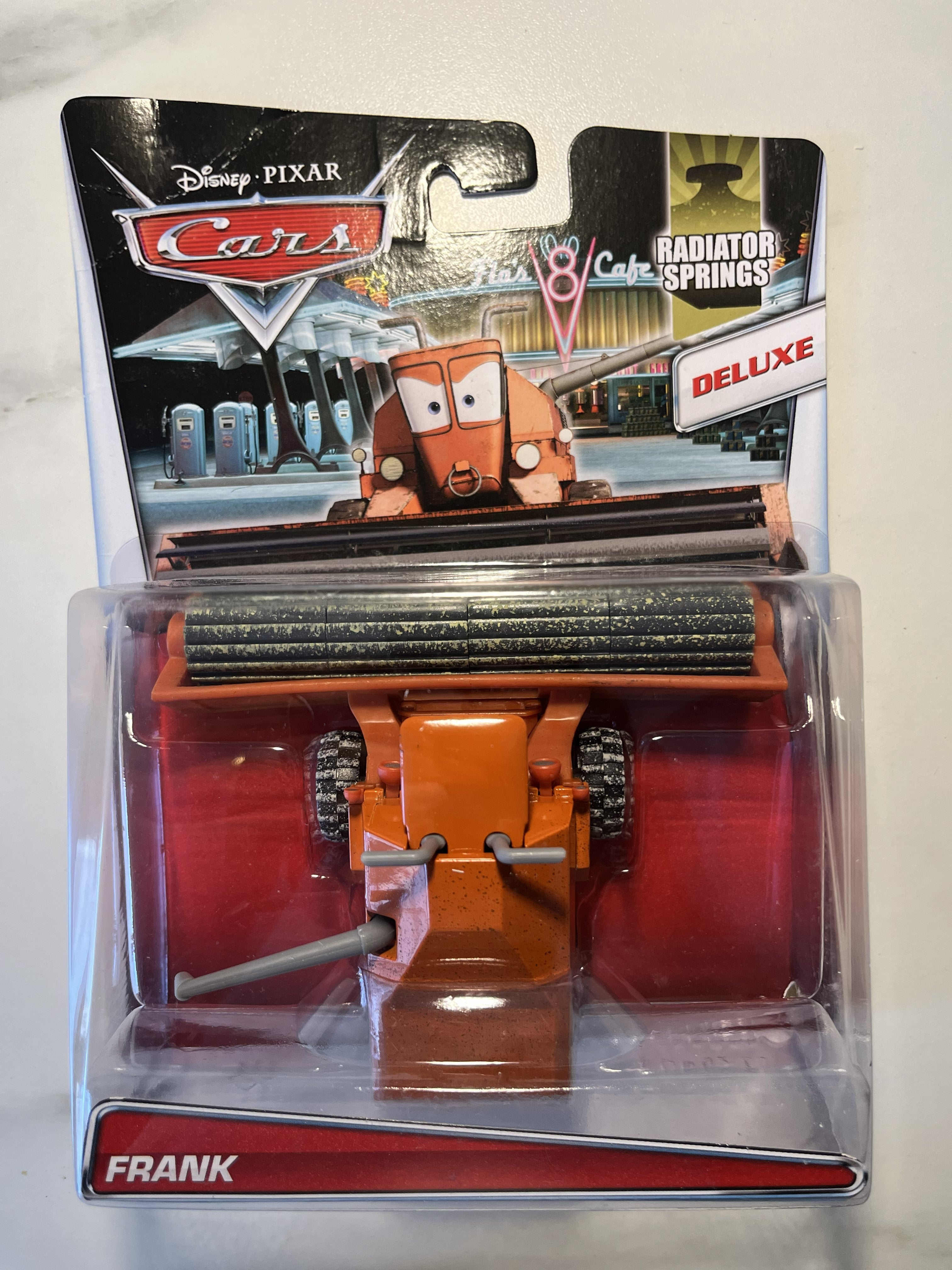 Frank – Disney Pixar Cars Deluxe – Radiator Springs – Mattel – Neuf sous blister