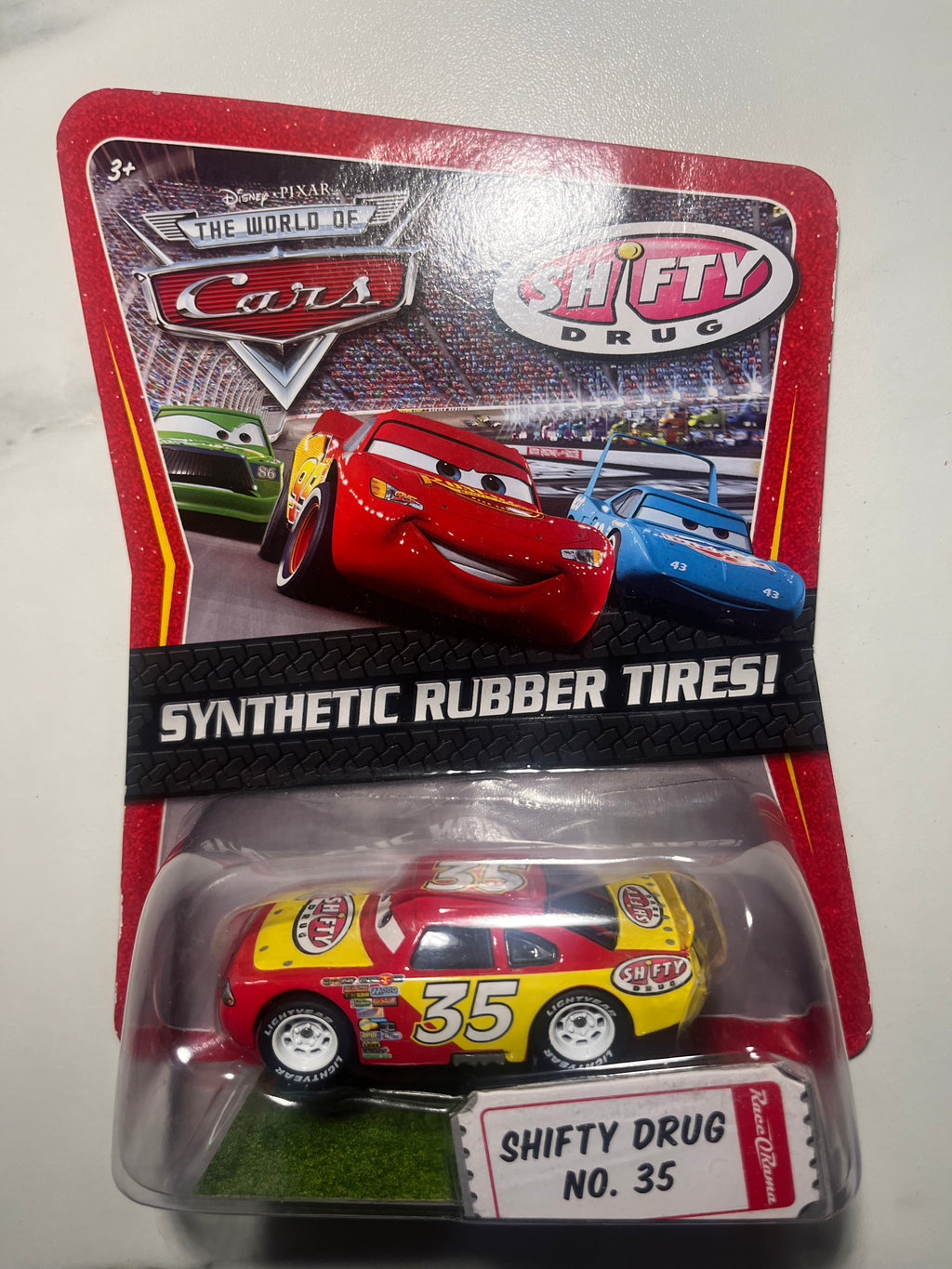 Kevin Racingtire Shifty Drug No. 35 – Race-O-Rama – Disney Pixar Cars – Mattel – Pneus en caoutchouc – Neuf sous blister