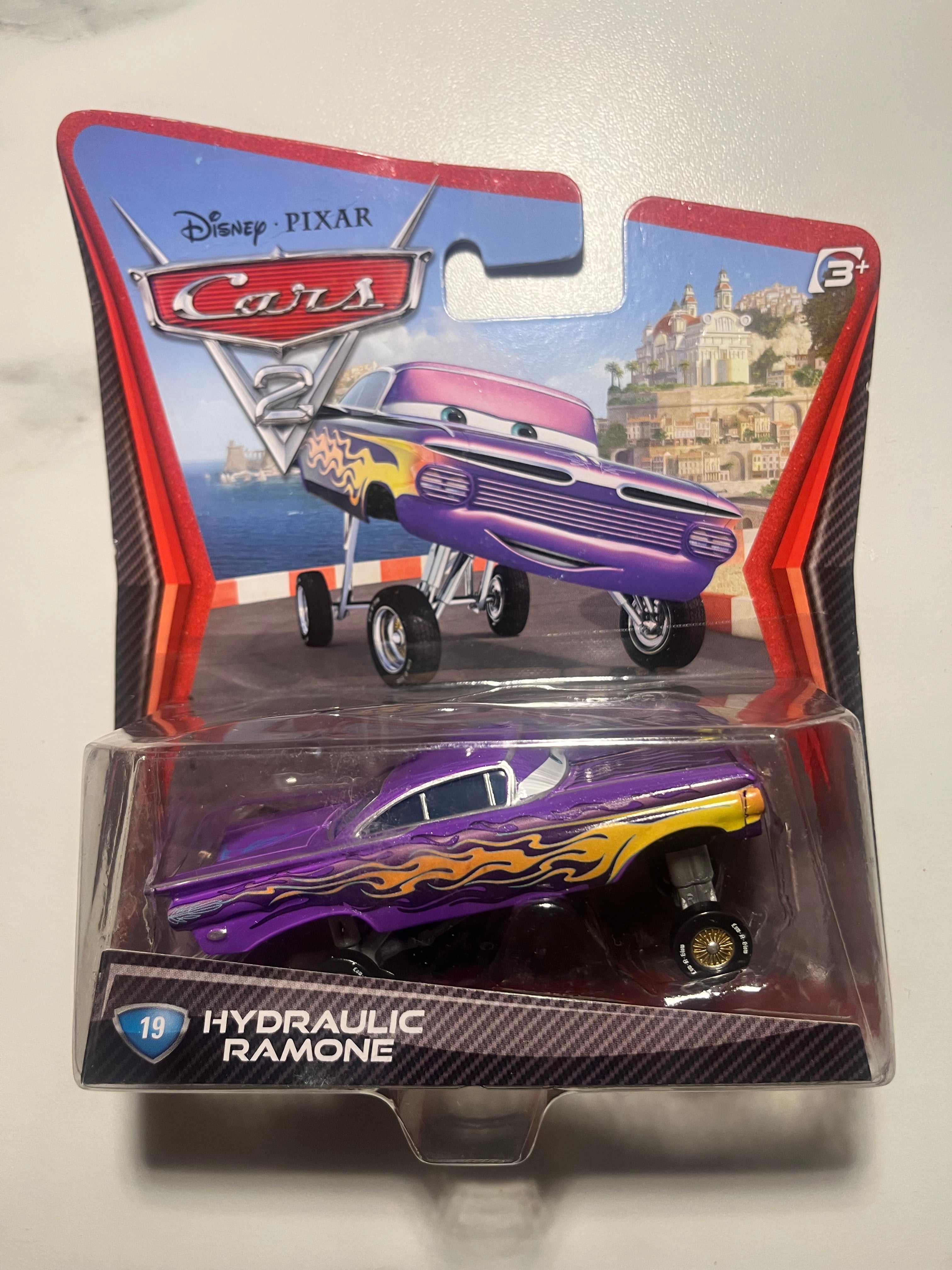 Hydraulic Ramone #19 – Disney Pixar Cars 2 – Mattel – Lowrider – Neuf sous blister