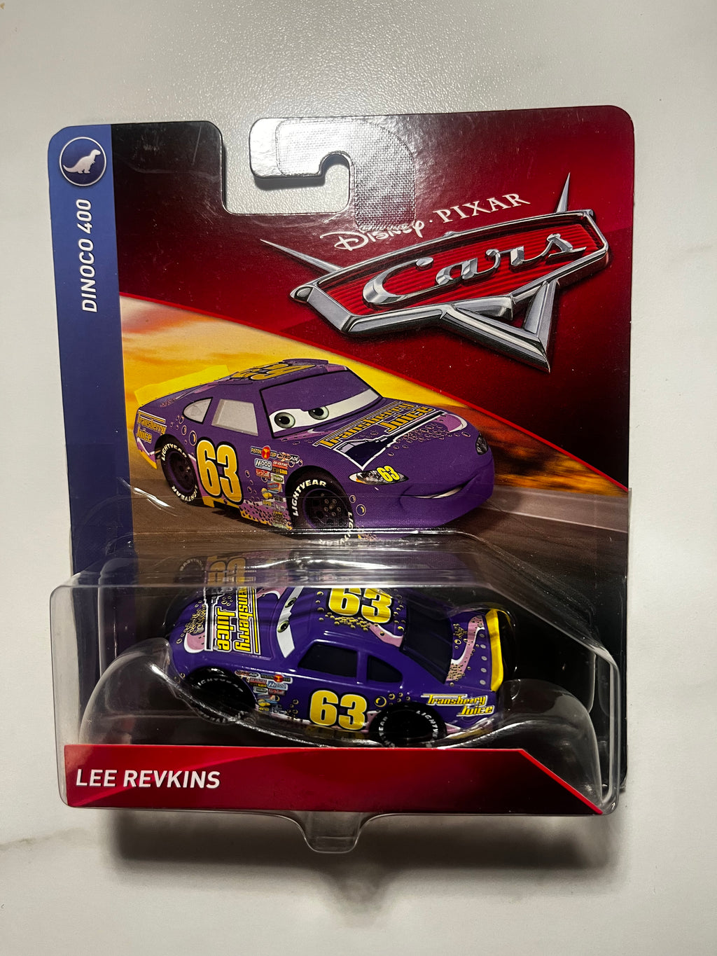 Lee Revkins Transberry Juice n°63 – Disney Pixar Cars Dinoco 400 Mattel 1:55 – Sous Blister (rare)