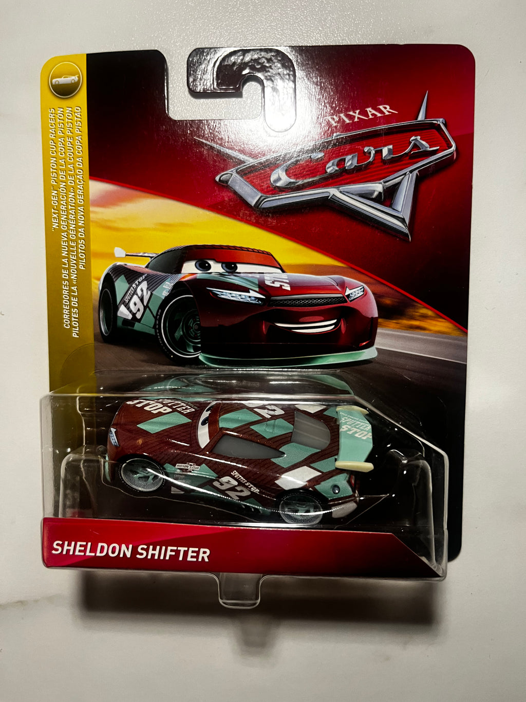 Sheldon Shifter Next-Gen n°92 – Disney Pixar Cars Mattel 1:55 – Neuf sous Blister (rare)